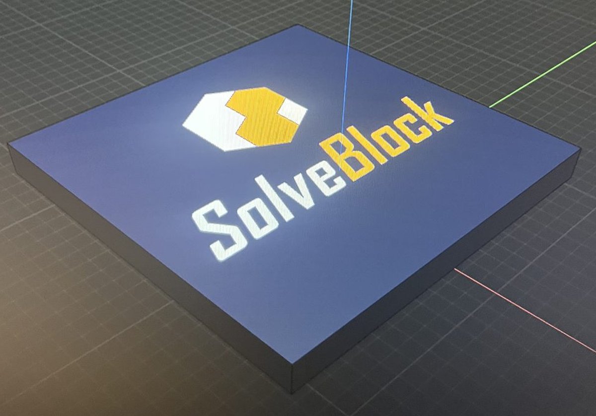 The SolveBlock logo modelled as a raised badge in 3D CAD software.